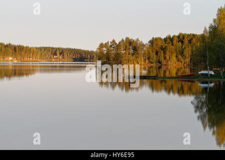 Calm Lappish lake landscape in summer Stock Photo