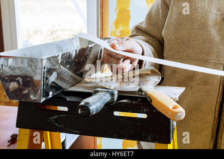 Set of assorted plaster trowel tools and spatula. Construction tools Tools for plastering walls Stock Photo