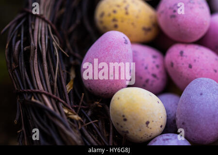 Mini Easter Eggs in Basket Stock Photo