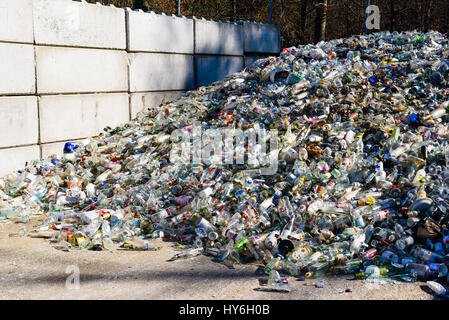 Ronneby, Sweden - March 27, 2017: Documentary of public waste station. Large pile of clear glass destined for recycling. Stock Photo