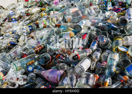 Ronneby, Sweden - March 27, 2017: Documentary of public waste station. Large pile of clear glass destined for recycling. Stock Photo