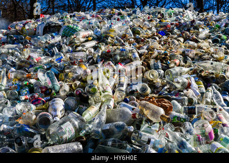 Ronneby, Sweden - March 27, 2017: Documentary of public waste station. Large pile of clear glass destined for recycling. Stock Photo