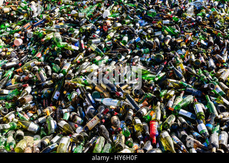 Ronneby, Sweden - March 27, 2017: Documentary of public waste station. Large pile of colored glass destined for recycling. Stock Photo