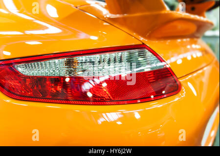 Back light of an orange modern sport car Stock Photo