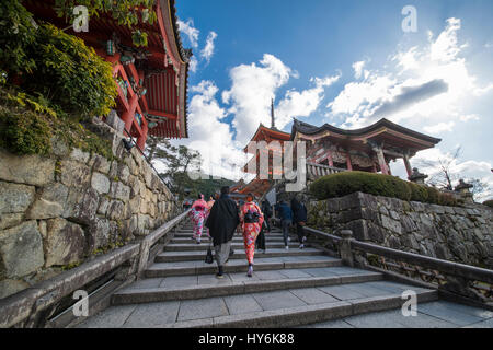 KYOTO, JAPAN - JANUARY 10 2016 : Japanese couple in traditional Kimono are walking on the way to Kiyomizu-Dera temple in Kyoto. Kyoto is the capital c Stock Photo