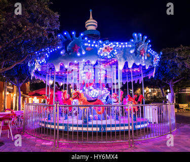 Night view of colorfully lit carousel Stock Photo