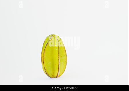 Exotic fruit carambola or starfruit (Averrhoa carambola) isolated on white background. Healthy eating dieting food. Stock Photo