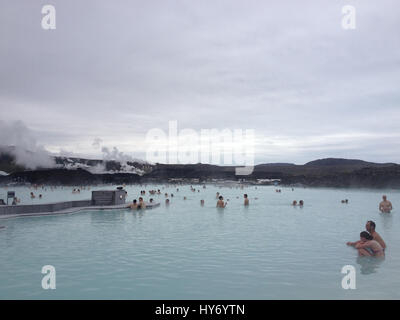 Grindavík, Iceland - 5 July 2015: People swimming and relaxing in the Blue Lagoon, a natural geothermal spa near Reykjavik,, Iceland. Natural mineral  Stock Photo