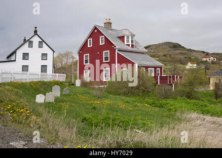 Campbell House (left, white, 1840) and Morris Manor (red, c1862), Old Methodist Cemetery, Registerted Heritage Properties, Trinity, Newfoundland Stock Photo