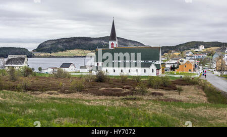St Paul's Anglican Church and graveyard and the old town of Trinity, Newfoundland Stock Photo