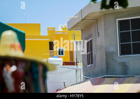 Beautiful mexican houses situated next to sea Stock Photo