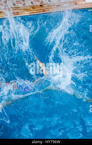 A swimmer in the Sky Pool, a transparent swimming pool suspended 35 ...
