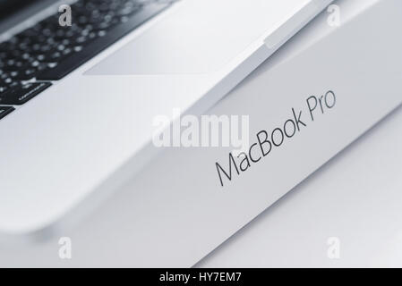 Kiev, Ukraine - May 15, 2016: Apple MacBook Pro with Retina Display on the surface of original box with lettering MacBook Pro closeup. It is a laptop  Stock Photo
