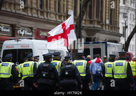 London, UK. 1st April, 2017.  The English Defence League (EDL) and Britain First held a protest march through London. The Britain First group were protesting against terrorism in response to the reason terrorist attack in London on March the 22nd 2017. Stock Photo