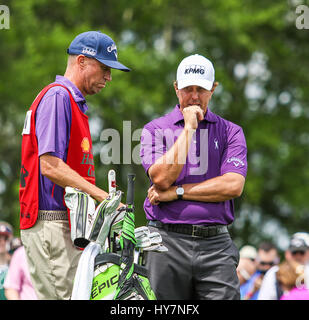 Humble, Texas, USA. 1st Apr, 2017. Phil Mickelson talks with his caddie during the third round of the Shell Houston Open at the Golf Club of Houston in Humble, Texas. John Glaser/CSM/Alamy Live News Stock Photo