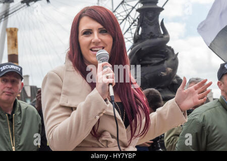 London, UK. 1st Apr, 2017. Britain First Deputy Leader Jayda Fransen speaks in front of the crowd at their rally on the Embankment. Marches and rallies by Britain First and the EDL (English Defence League) in reaction to the London terror attack were opposed by the Anti-Fascist Network, London Antifascists and Unite Against Fascism (UAF) who accuse the extremist right of using the attack to fuel their anti-Muslim and anti-migrant racist propaganda. Peter Marshall ImagesLive Credit: Peter Marshall/ImagesLive/ZUMA Wire/Alamy Live News Stock Photo