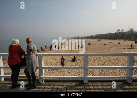 Gdansk, Poland. 02nd Apr, 2017. People enjoing warm weather, at the Gdansk Brzezno Pier on the Baltic sea coast are seen in Gdansk, Poland on 2 April 2017 . With temperatures close to 20 Celsius degrees, spring definetly has come to Poland. Meteorologists predict next few days of warm weather in Poland Credit: Michal Fludra/Alamy Live News Stock Photo