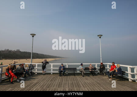 Gdansk, Poland. 02nd Apr, 2017. People enjoing warm weather, at the Gdansk Brzezno Pier on the Baltic sea coast are seen in Gdansk, Poland on 2 April 2017 . With temperatures close to 20 Celsius degrees, spring definetly has come to Poland. Meteorologists predict next few days of warm weather in Poland Credit: Michal Fludra/Alamy Live News Stock Photo
