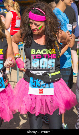 Bournemouth, Dorset, UK. 2nd Apr, 2017. Participants wait for the start of the 5k run. A day of warm sunny weather for runners taking part in the 35th Bournemouth Bay Run on the theme of the 80s along Bournemouth's sea front. Participants run to raise vital funds for the British Heart Foundation charity to fight against heart disease. Credit: Carolyn Jenkins/Alamy Live News Stock Photo