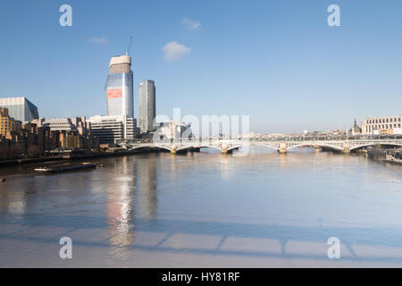 London, UK. 2nd April 2017. UK Weather: Blue skies on warm spring day in London. View over Blackfriars bridge inlcuding One blackfriars building under construction on south bank. Credit: WansfordPhoto/Alamy Live News Stock Photo
