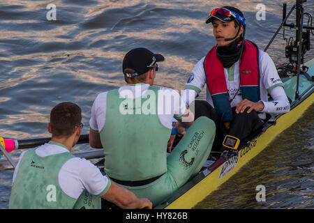 London, UK. 02nd Apr, 2017. The Cambridge boat approaches Putney Bridge driven on to the start by their cox - The Oxford v Cambridge boat race starts at Putney and heads upstream. It is supporting cnacer research and is sponsored by Mellon Bank - London  02 Apr 2017. Credit: Guy Bell/Alamy Live News Stock Photo