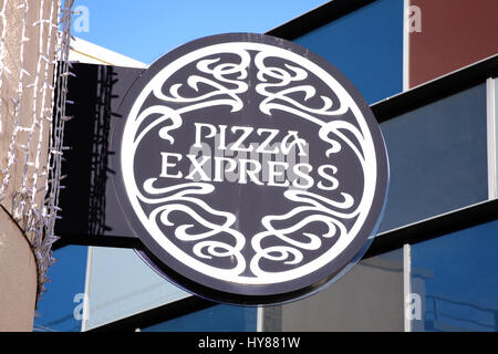 Carmarthen, Wales, UK, October 22, 2016 :  PizzaExpress logo advertising sign outside its restaurant in St Catherine's Walk Stock Photo