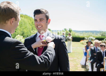 A groom and best man waiting for the bride prior to the wedding service Stock Photo