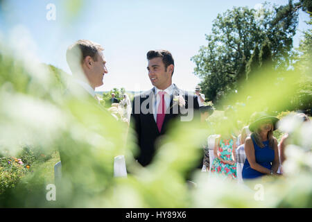 A groom and best man waiting for the bride prior to the wedding service Stock Photo