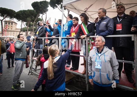 Rome, Italy. 02nd Apr, 2017. Rome April 02 2017; Runners participate in the 23rd edition of the Rome Marathon, with the backdrop of the ancient Colosseum, in Rome. the pictured Mayor of Rome Virginia Raggi Credit: Andrea Ronchini/Pacific Press/Alamy Live News Stock Photo