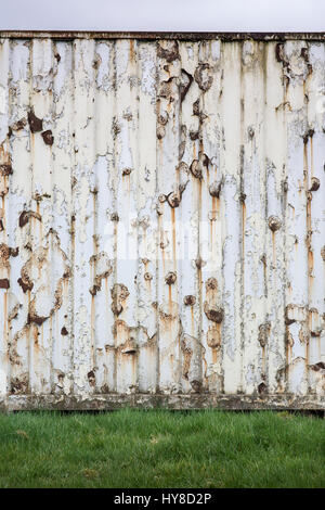 industrial containers and objects, on site abstract manufacturing shots cable reels and shipping containers Stock Photo