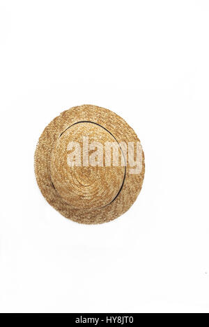 Straw hat-boat isolated on white background, close-up. Stock Photo