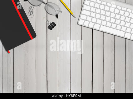 Office table top view with laptop and supplies Stock Photo
