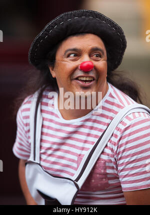 A Red Nose actor - performer out side of Teatro Juarez in Guanajuato. México. Stock Photo