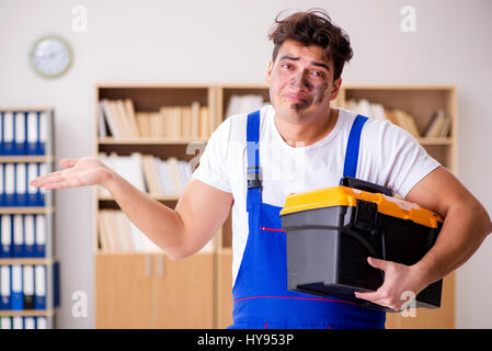 Funny Man doing electrical repairs at home Stock Photo