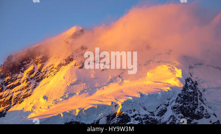 Landscape detail of glacier in colorful golden sunset, Aoraki, New Zealand Stock Photo