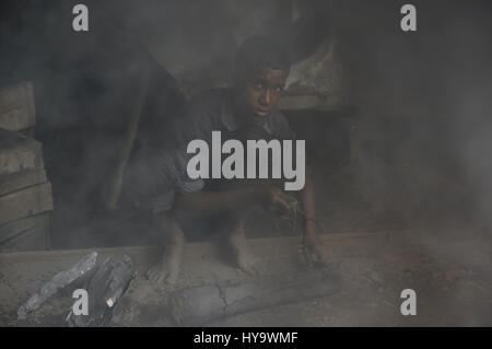 April 2, 2017 - Dhaka, Bangladesh - A child labor Yeachin (13), works in smoke at Keraniganj dockyard. (Credit Image: © Md. Mehedi Hasan via ZUMA Wire) Stock Photo