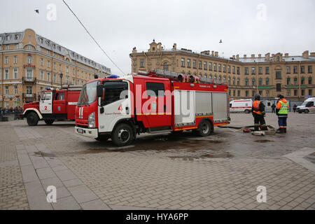 St. Petersburg, Russia. 3rd Apr, 2017. Firefighters stand outside the metro station where a blast went off in St. Petersburg, Russia, on April 3, 2017. Two subway stations were hit by explosions with destructive elements in the Russian city of St. Petersburg Monday and so far at least 10 people have been reported killed and 50 others injured, according to Russian media. Credit: Irina Motina/Xinhua/Alamy Live News Stock Photo