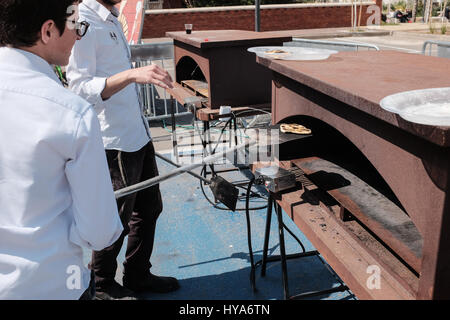 Kfar Chabad, Israel. 3rd April, 2017. A workshop for preparation of matzah operates outside '770' in the village of Kfar Chabad, a replica of the Chabad Lubavitz headquarters at 770 Eastern Parkway, Crown Heights, Brooklyn, New York. Credit: Nir Alon/Alamy Live News Stock Photo