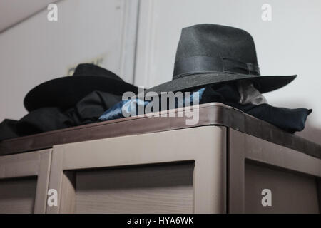 Kfar Chabad, Israel. 3rd April, 2017. Hats lay in the workers' locker room at the Chabad Matzah Bakery in the village of Kfar Chabad. Credit: Nir Alon/Alamy Live News Stock Photo