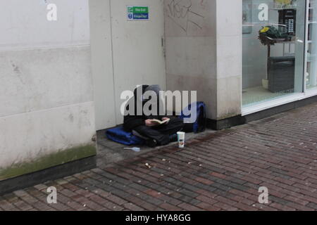 Images taken Saturday 1st April 2017 of homeless people in Belfast city centre. their were a lot more around but i chose 3 to start with.Saturday was very mild weather wise for a change with the start of spring.I am back at college studying and this is a topic    i have started in relation to coursework I believe this is a subject that needs more attention,More funding and less judgement. My dad always said the only time you should look down at someone is when you are helping them up. Stock Photo