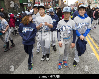 Little League players parade into Prospect Park Saturday to celebrate the start of baseball season and the park’s 150th anniversary. Stock Photo