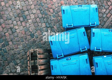 Plastic garbage dumpster containers on the street from above Stock Photo