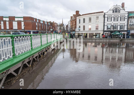 BRIDGEWATER, UK: SPRINGTIDE has nearly flooded the streets of this British market town with the waters of the rover close to bursting. After the UK was pounded by rain over the weekend, pictures of the iron bridge in the centre of town show how the river is close to spilling over into the nearby streets. The town made national news after severe flooding in 2011 and in 2014 a tidal barrage was installed as part of a £100 plan to combat flooding and protect homes and businesses in the Somerset Levels. Stock Photo