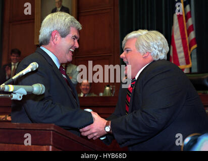 U.S House Speaker Newt Gingrich, left, meets comedian Chris Farley who impersonates Gingrich on the television show Saturday Night Live during an even on Capitol Hill April 4, 1995 in Washington, DC.