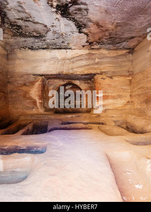 PETRA, JORDAN - FEBRUARY 21, 2012: interior of ancient tomb in Petra town. Rock-cut town Petra was established about 312 BC as the capital city of the Stock Photo