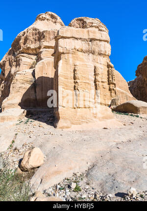 Travel to Middle East country Kingdom of Jordan - relief on Djinn Blocks at Bab as-Siq road to Petra town in winter Stock Photo