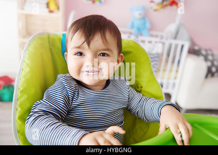 Waist up of baby boy over feeding time Stock Photo