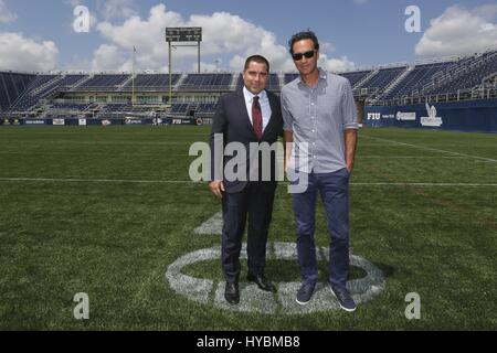 Riccardo Silva, left, and Alessandro Nesta hold for a photo in Florida International University's newly renamed Ricardo Silva Stadium in Miami, Florida on April 3, 2017 Stock Photo