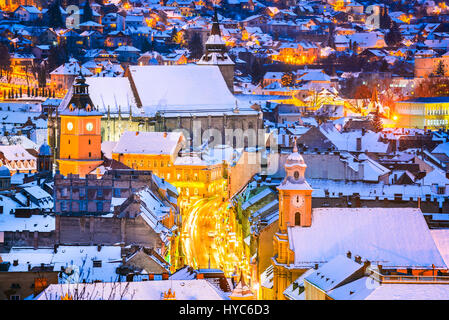 Brasov, Romania - Medieval Saxon city built in 13th century by Transylvania colonists. Twilight winter view. Stock Photo