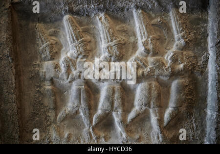 Hittite relief sculptures of Gods at the Yazilikaya Sancutary [ i.e written riock ], Hattusa, Turkey.  The largest known Hittite sanctuary. 12th - 13t Stock Photo
